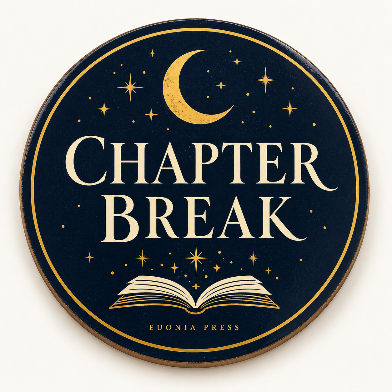 Chapter Break Coaster by Euonia Press — round navy moon-and-book design, front view