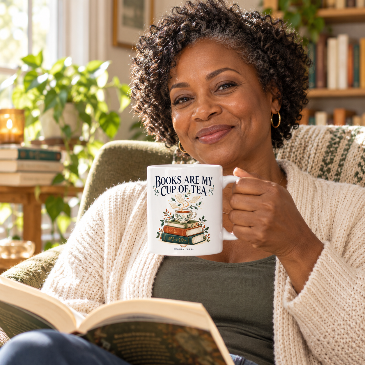 Books Are My Cup of Tea Mug by Euonia Press in use during a reading or writing break