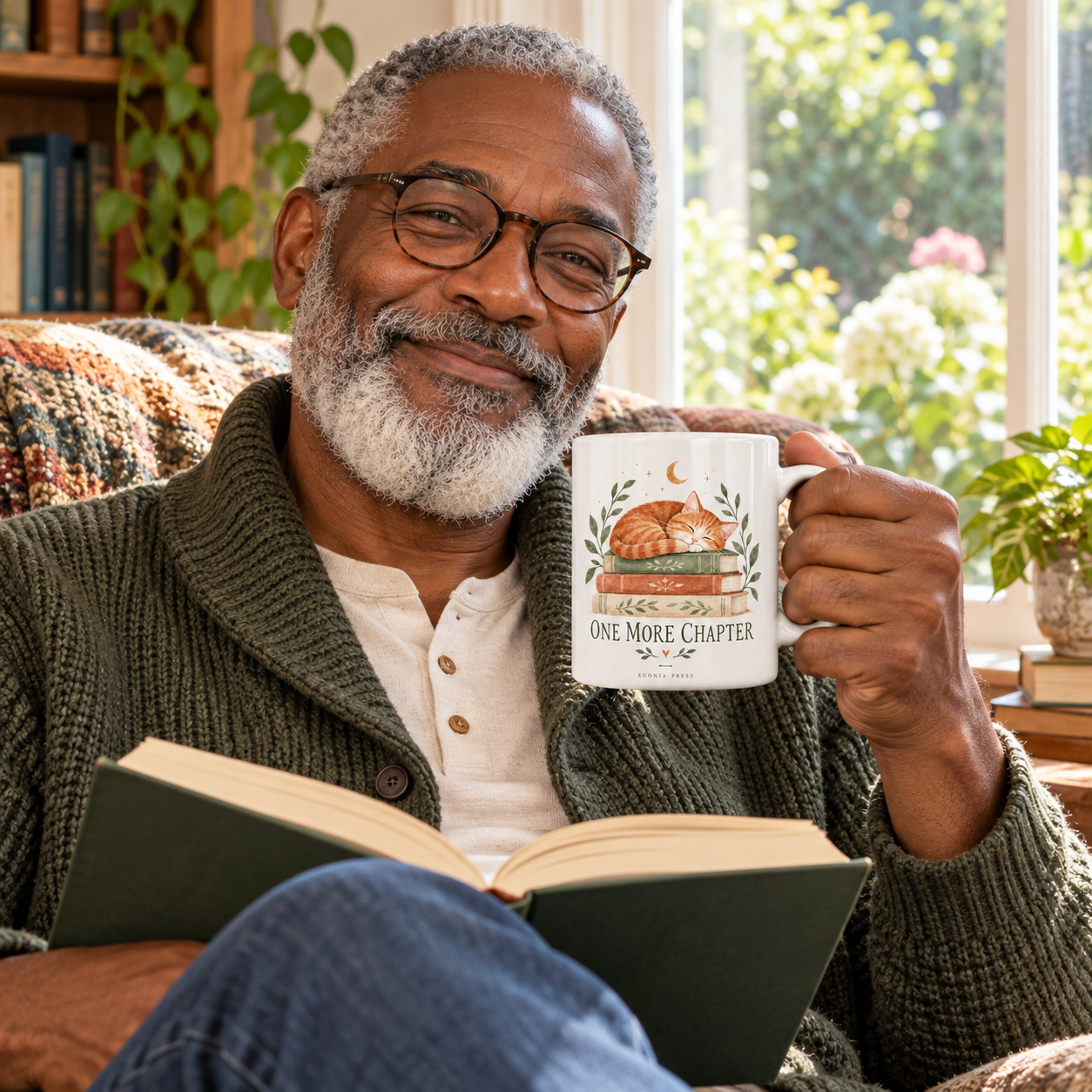 One More Chapter Mug by Euonia Press in use during a reading or writing break