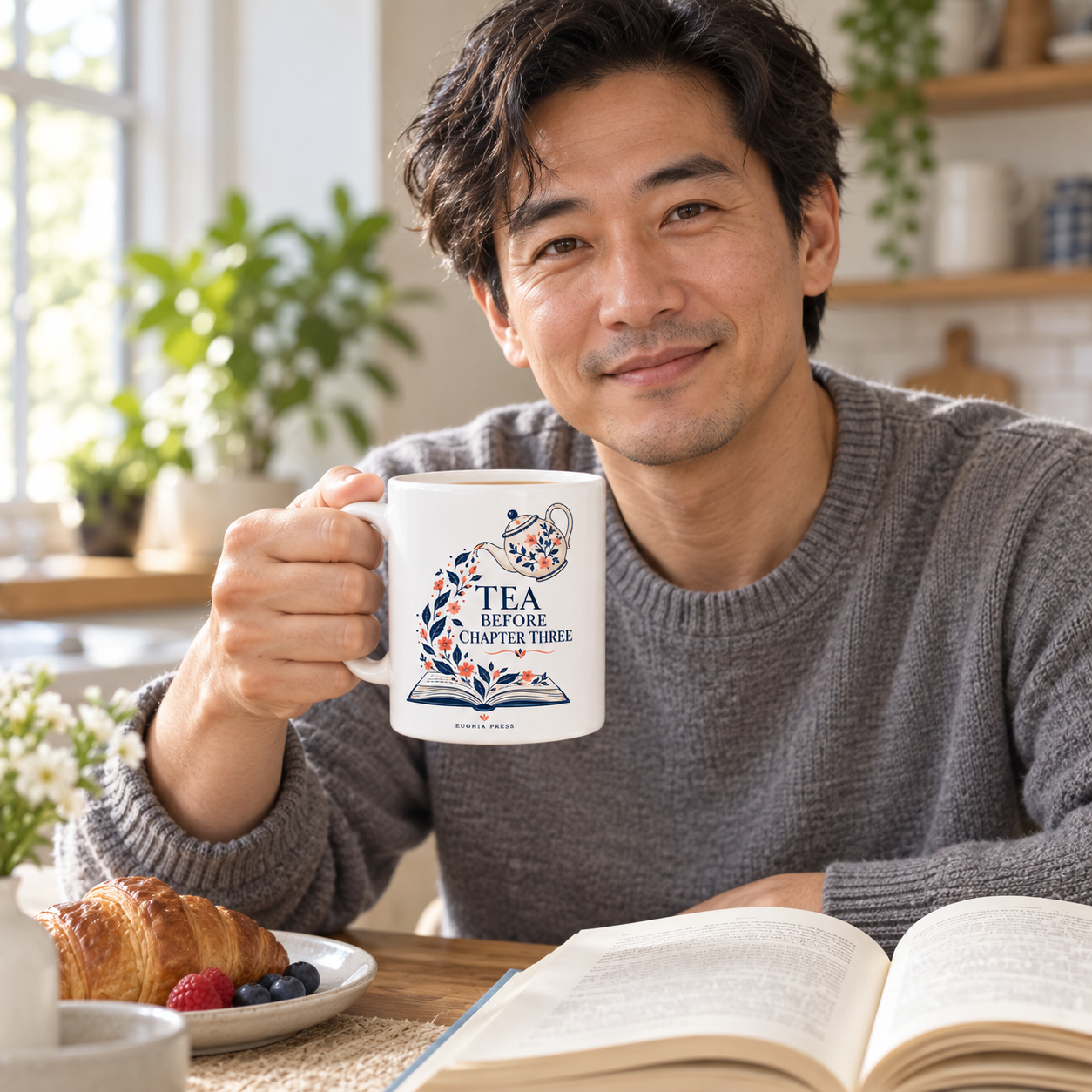 Tea Before Chapter Three Mug by Euonia Press in use during a reading or writing break