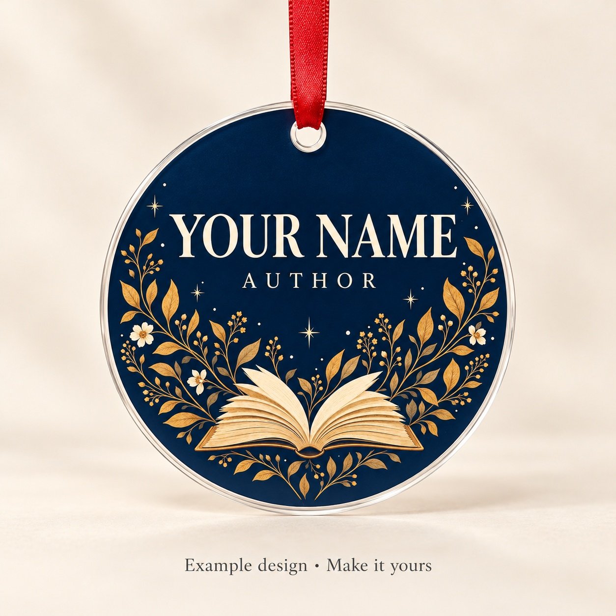 Custom Author Name Acrylic Ornament example in navy and ochre with red ribbon