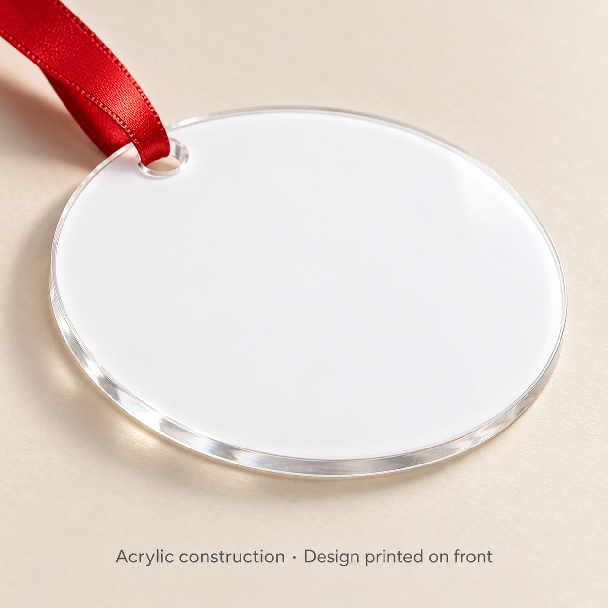 Blank acrylic construction detail showing the clear edge, hanging hole and satin ribbon